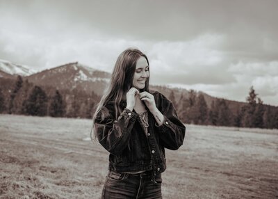 senior walking towards camera smiling