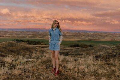 Outdoor family photo session in Wyoming during golden hour, with a joyful family posed in a natural, scenic setting.