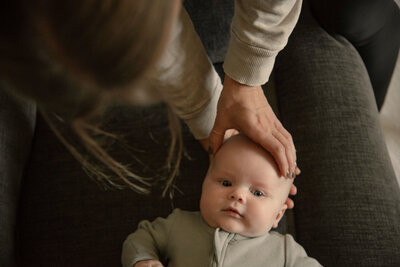 craniosacral therapist working with baby