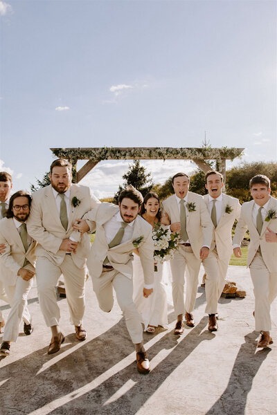 Raleigh wedding party in white suits