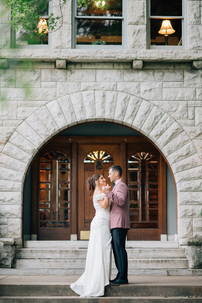 Bride and Groom share their first dance outside The Simpson House in KC. Photo by Anna Brace a KC Wedding Photographer.