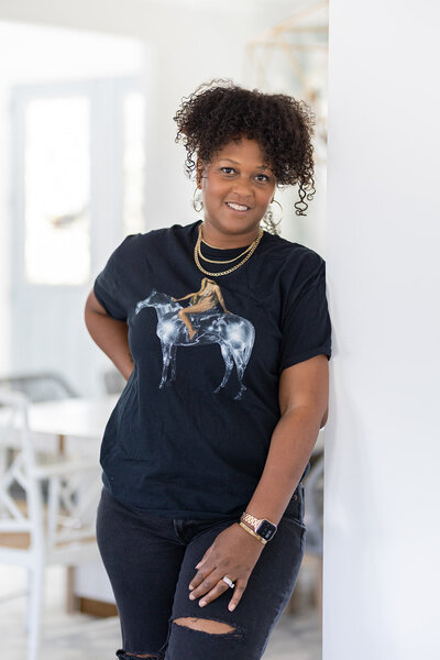 Image of female business owner in Beyonce T-shirt
