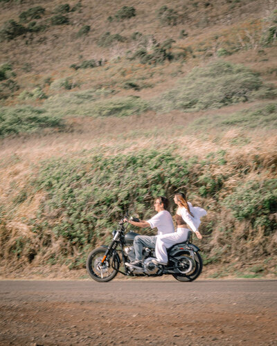Oahu wedding photographer capturing a bride and groom at sunset