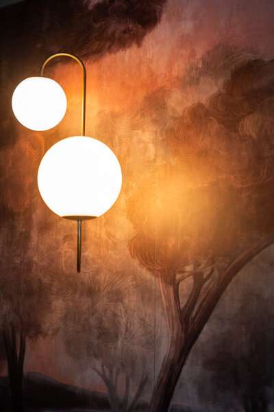 Intimate private dining space with warm ambiance at Revé restaurant