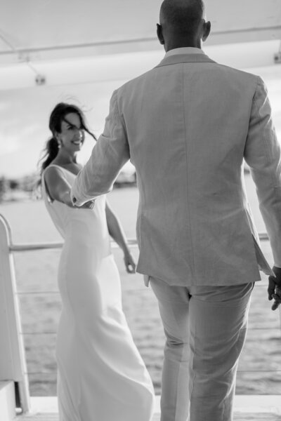 Bride and groom walk up memorial steps at their DC wedding