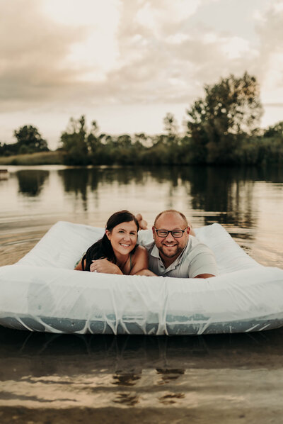 Loving Fowlerville Michigan couple, Megan and Karl Witt, posing for picture at Lakeside Photography