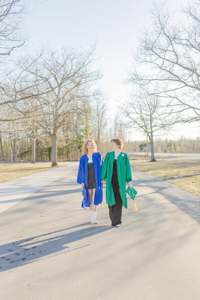 portrait of two sisters in their cap and gown