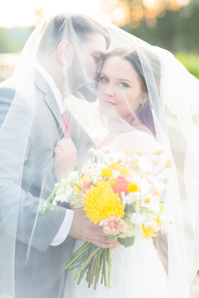 bride and groom holding hands