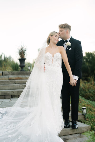 Couple holding hands during an intimate Nashville engagement session, captured by Tennessee wedding photographer Diana Marie.