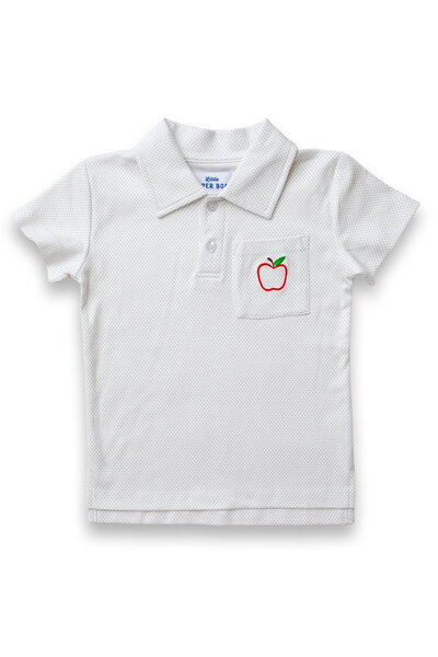 A white and sage green dot polo shirt with apple embroidered on the pocket for little boys back to school