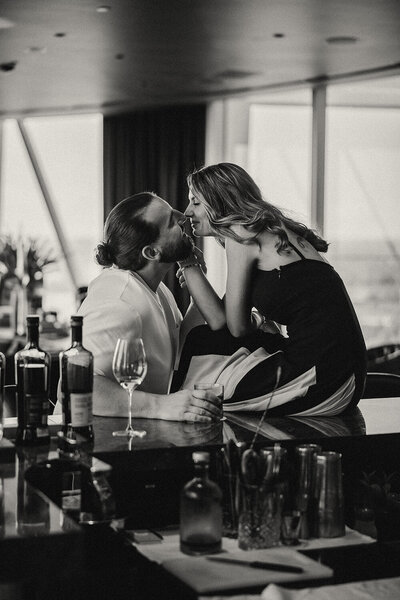 Couple sharing a quiet moment at a cafe captured by Sunshine Coast photographer in Black and White