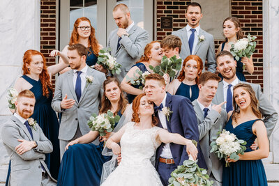 Catholic bride with her funny friends taken by  a Wedding Photographer in Atlanta