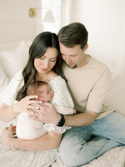 Maternity session at Lake Bryan with a beautiful couple in neutral clothes taken by Meg Staheli photo, College Station Maternity Photographer.