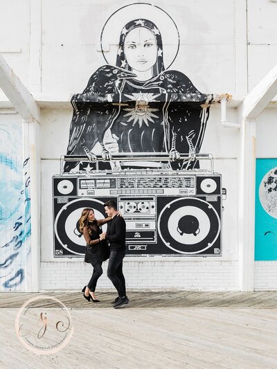 funky engagement photo with street art