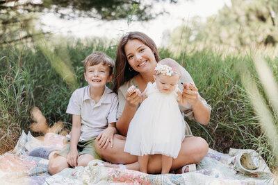 sibling image during a family photoshoot in a field