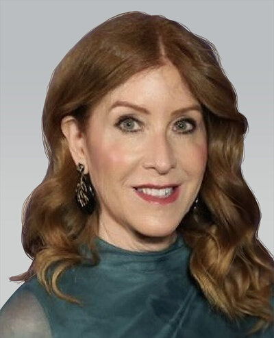 Headshot of a woman with long auburn hair and light eyes wearing a high neck, green, silk top.