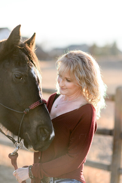 The recruiter mom who is a fashion influencer poses for Denver branding photos with her Denver branding photographer.