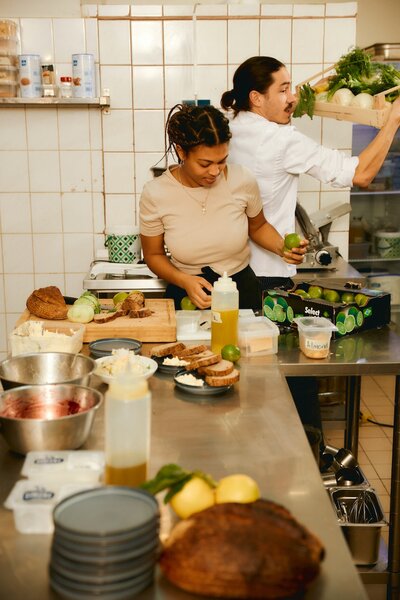 Two people cooking together