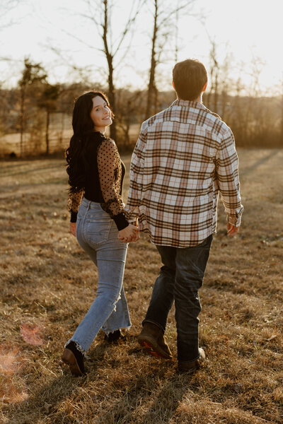 Photo of a couple holding hands during their photoshoot in Bloomington Indiana.
