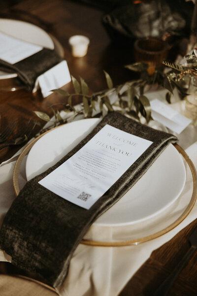 detail photo of menu on velvet napkin at montana wedding