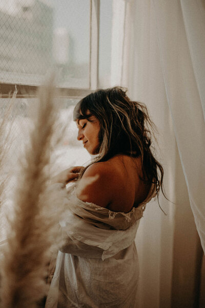 neutral boho portrait with pampas and flowing hair