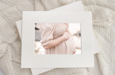 Pregnant mother sitting the the stairs with toddler son during maternity session in york pa