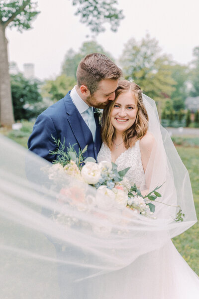 Bride and groom walk up memorial steps at their DC wedding