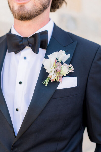 groom-in-tuxedo-with-boutonniere