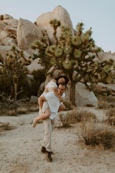 man hugging woman from behind