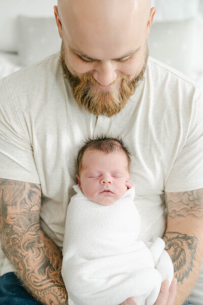 Philly mom dresses newborn baby for her newborn photo session with AnneMarie Hamant