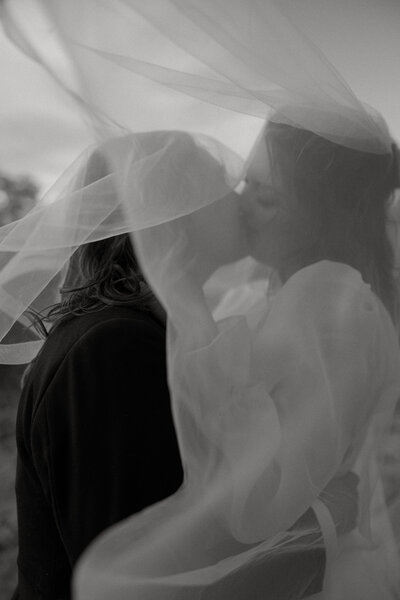 Couple giddy in the sunset after they just said their wedding vows in Walla Walla Washington