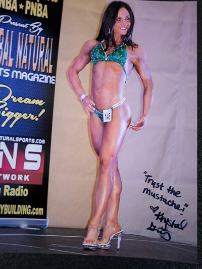 Kristal G"s competes in a body building event