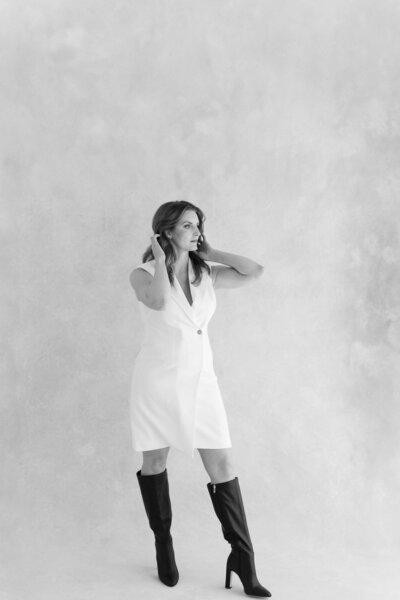 Portrait of Brianna Rose holding her camera, fine art wedding photographer based in Florida and Missouri