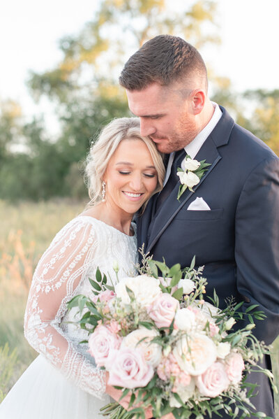 bride and groom portrait at sunset by The Charles Fort Wayne Wedding Photographer Courtney Rudicel