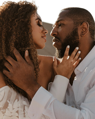 Close up of bride and groom during their sand dunes elopement.