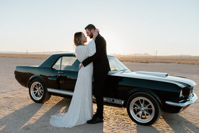 Las Vegas elopement with vintage car at sunrise