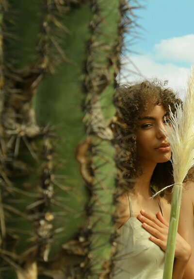 Image of woman modeling with plants from Brand photographer nyc at ADP Studio