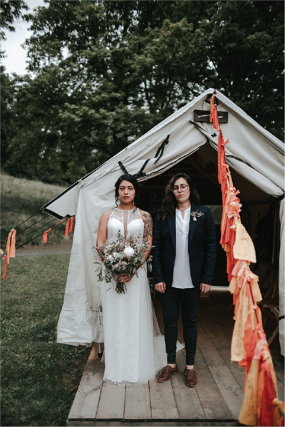 Contact_coupleinfrontoftent