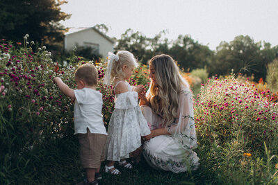 Family looking at flowers in a flower field in Scottsdale