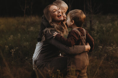 Family enjoying golden hour light during an outdoor lifestyle session in The Woodlands
