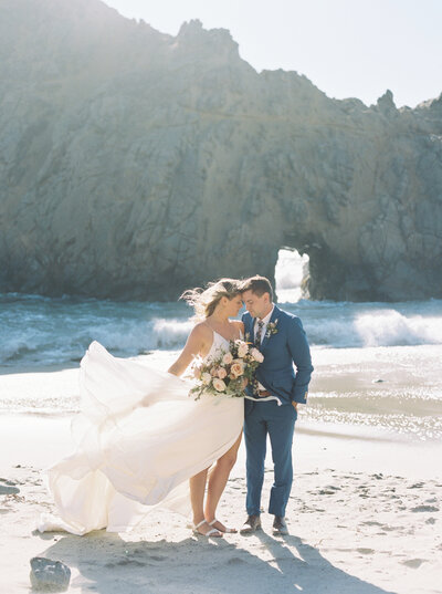 A portrait of a bride and groom at a wedding in Big Sur, California