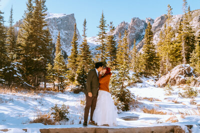 Groom reading vows to bride during their Colorado elopement in Breckenridge