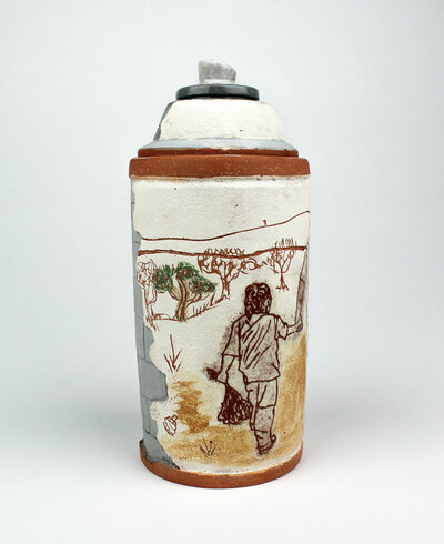 A ceramic spray paint can jar is decorated with imagery of a little girl holding someones hand while walking through the desert