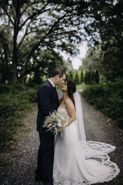 married couple kissing after wedding in dade city florida