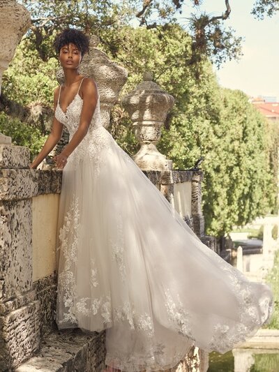 To flip the "ball gown wedding dress" script, one might consider sparkle tulle in tiered layers. Everything else just feels dull in comparison.