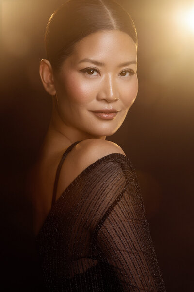 Glamorous studio shot of Danielle Yu with luxurious makeup, captured by Ylva Erevall.