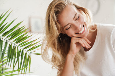 Woman feeling happy after neurofeedback therapy session