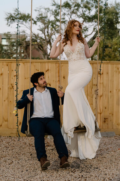 Documentary style wedding photography of couple on a swing