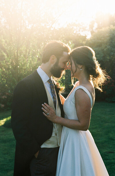 35mm portrait of bride and groom at golden hour