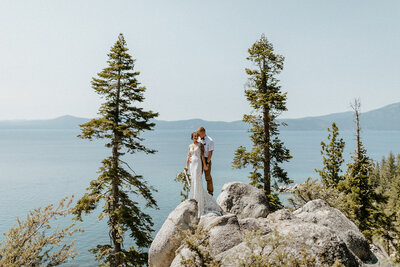 Lake Tahoe Elopement portraits with gorgeous view of the lake.